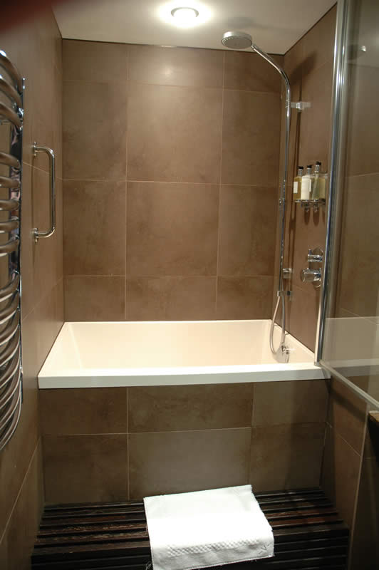 The Calyx works well as a space-saving bath. A Calyx deep soaking tub, installed at the Vincent Hotel, Southport