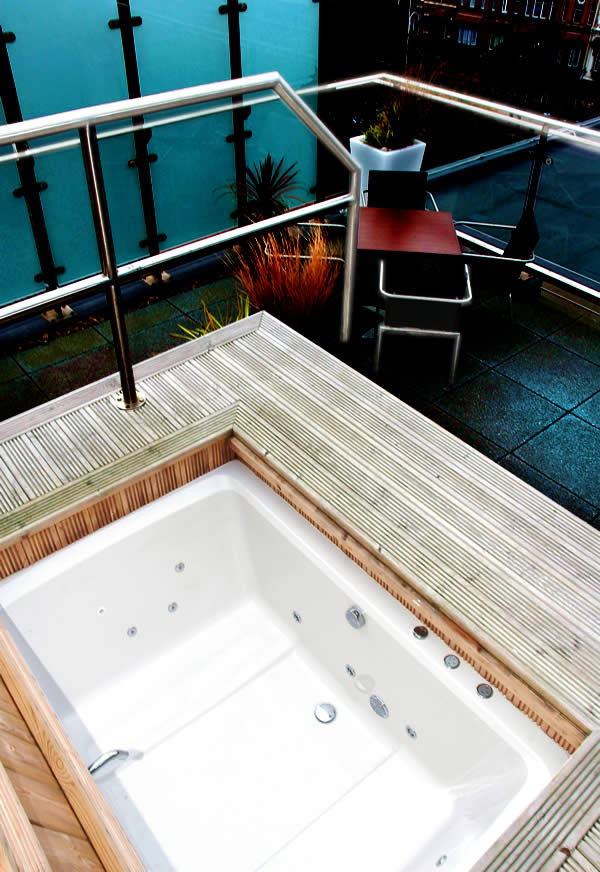 Xanadu Japanese-style soaking tub A Xanadu 2-seat soaking tub was installed on the penthouse balcony.